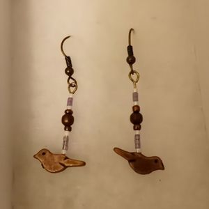 Purple and white dove earrings.